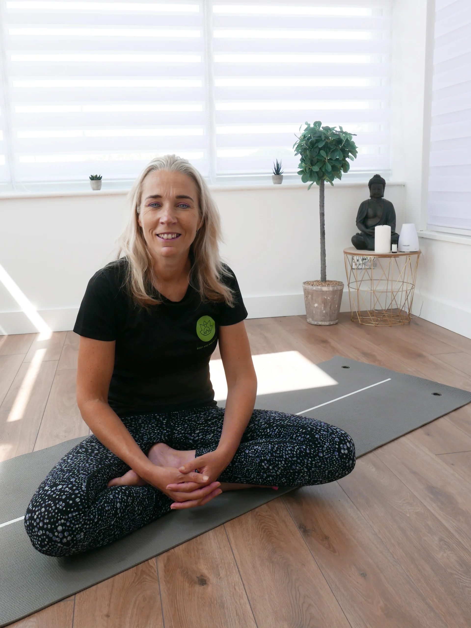 Michelle Carpenter on yoga mat